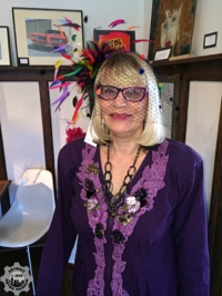 DMM's Michele posing in her favorite hat from Mr. Song