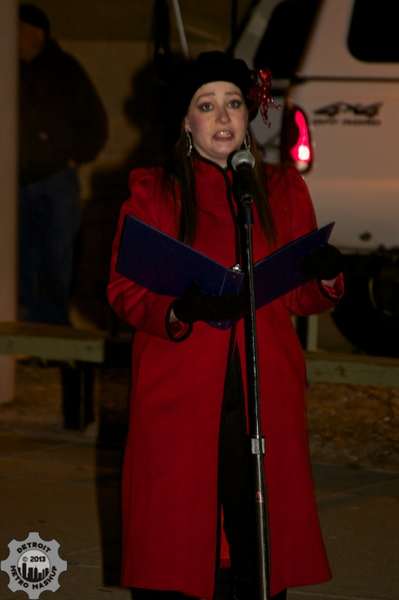 Melanie Aaron singing at the Holiday Extravaganza tree lighting