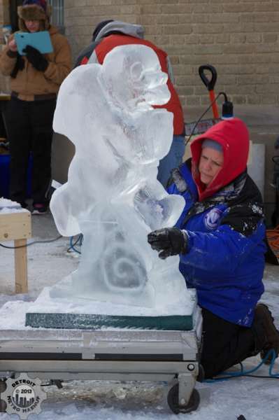 Carving an ice sculpture