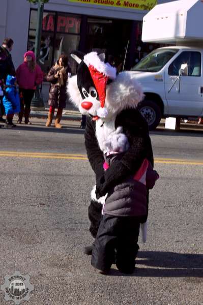 Sylvester the cat hugs a kid