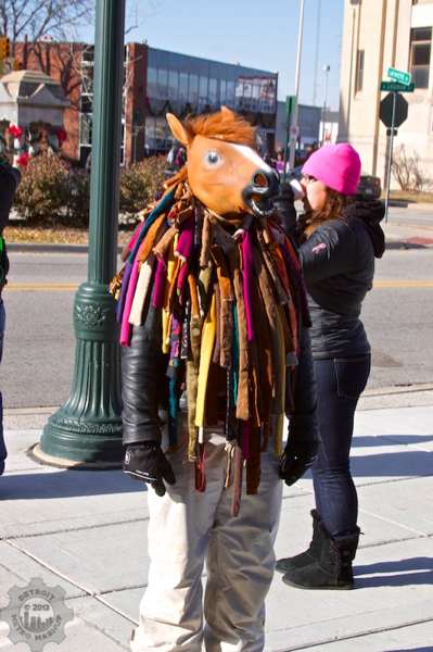Ice sculptor in warm horse costume