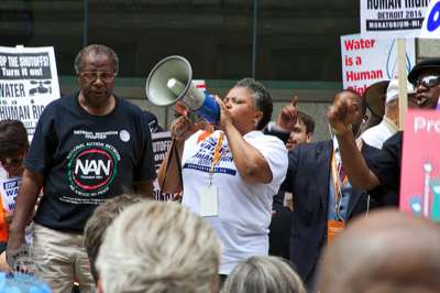 Detroit activist Monica Lewis Patrick rouses the crowd