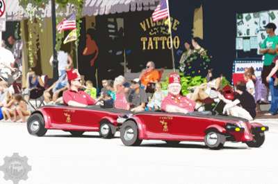 Shriners in comical cars